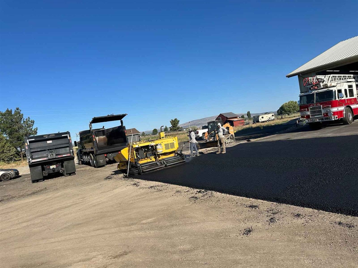 Crew working on a commercial pavement project